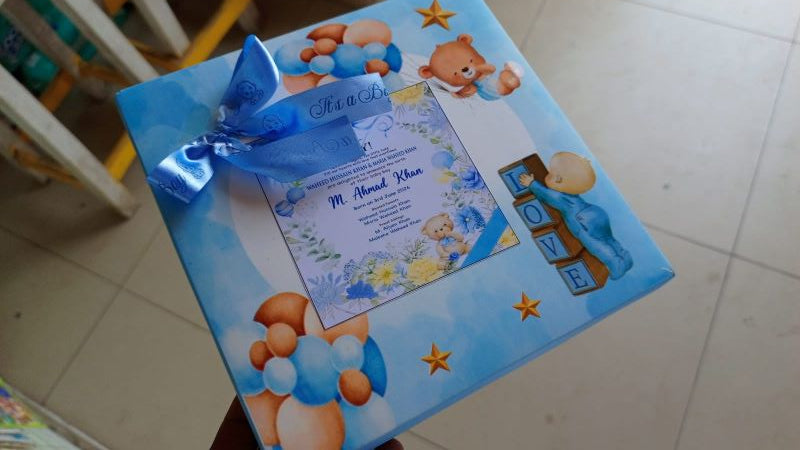 Customized baby birth announcement mithai boxes in Pakistan with printed designs, available in 250g, 500g, and 1kg sizes